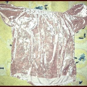 A light pink off the shoulder top